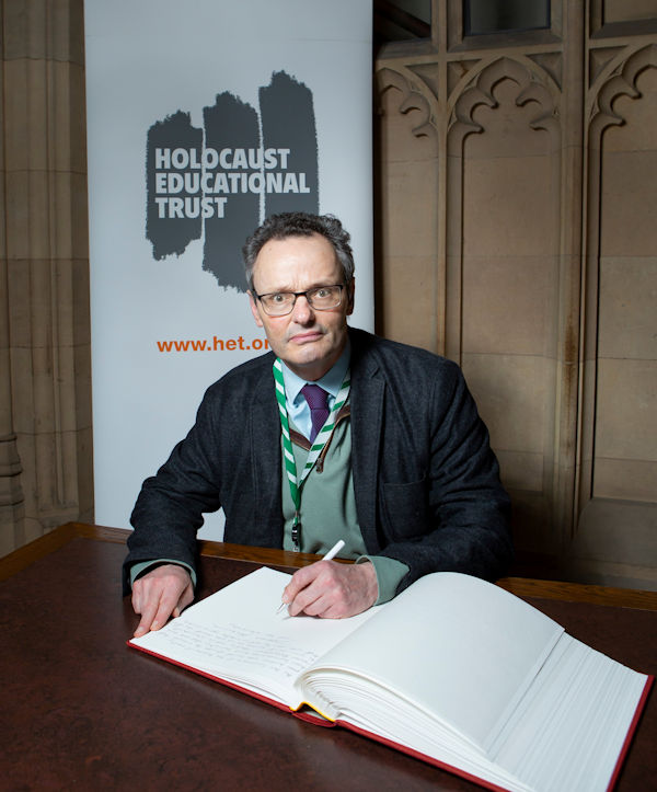 Peter Aldous MP signs the Holocaust Educational Trust Book of Commitment