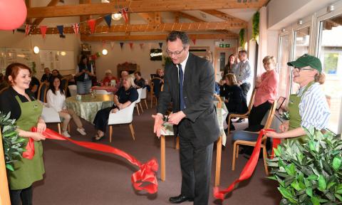 Peter Aldous MP formally opening Poppies Community Café